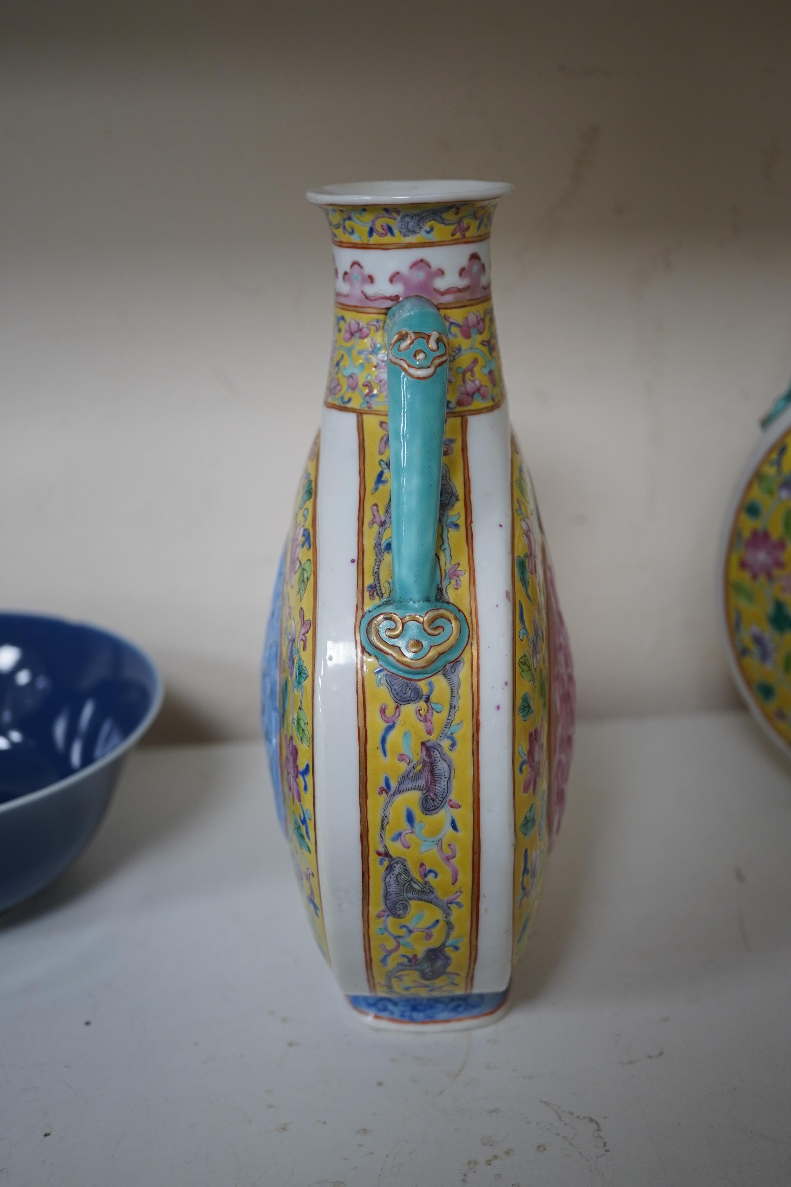 A pair of Chinese yellow ground double-walled moonflasks, bianhu, Daoguang marks, 19th century
